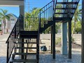Wooden staircase with new hand railings on Ft Myers Beach