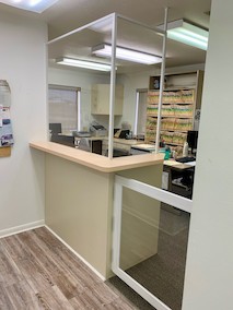 Sneeze guard and walkway partition installed at dentist's office on Del Prado Blvd