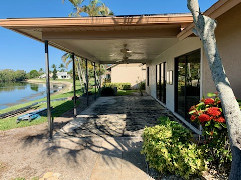 Lanai in Iona, FL w/stripped walls awaiting remodeling