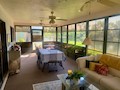 Before picture of sun room at home in Iona, FL