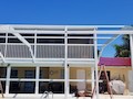 Mansard pool enclosure on Ft Myers Beach, FL