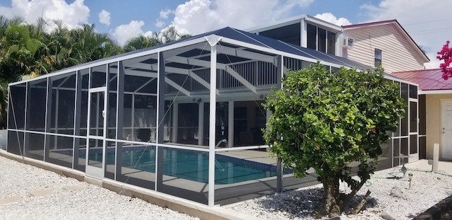 Side and rear view of pool enclosure by the Screen Doctor